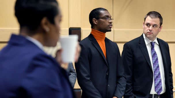 PHOTO: Shooting suspect Michael Boatwright, center, stands for the jury to enter the courtroom for closing arguments in the XXXTentacion murder trial at the Broward County Courthouse in Fort Lauderdale, Fla., March 7, 2023. (South Florida Sun-Sentinel/Pool via AP)