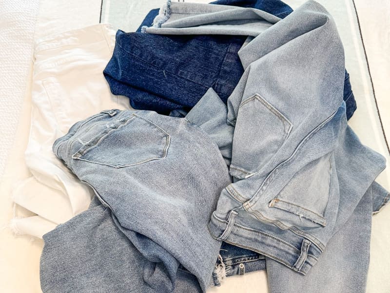 Jeans in a pile.