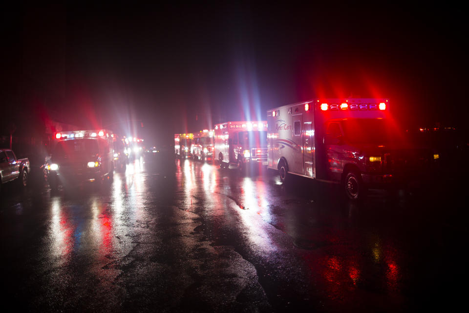 Ambulances wait outside New York University Tisch Hospital during an evacuation of the hospital after its backup generator failed when the power was knocked out by a superstorm, Monday, Oct. 29, 2012, in New York. Dozens of ambulances lined up outside NYU Tisch Hospital on Monday night as doctors and nurses began the slow process of taking people out. (AP Photo/John Minchillo)