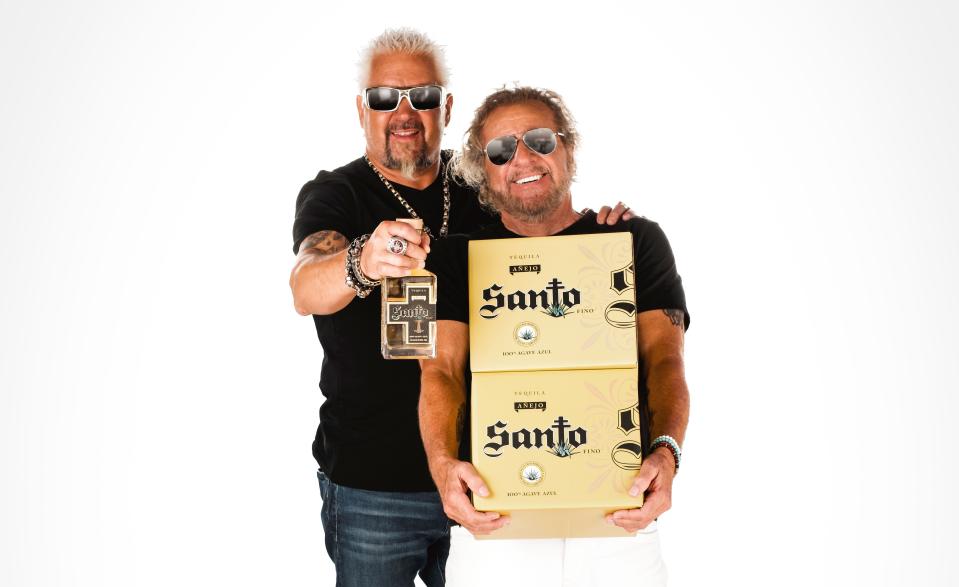 Chef Guy Fieri and rocker Sammy Hagar have released a new Santo Añejo Tequila, which is aged for 24 months.