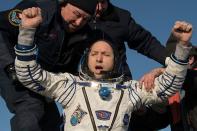 <p>NASA astronaut, Randy Bresnik, is helped out of his spacecraft just minutes after he, European Space Agency astronaut Paolo Nespoli, and Roscosmos cosmonaut Sergey Ryazanskiy arrive near the town of Zhezkagan, Kazakhstan after 139 days in space. The three men served as members of the Expedition 52 and 53 crews onboard the International Space Station.</p>