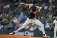 Arizona Diamondbacks starting pitcher Brandon Pfaadt throws against the Seattle Mariners during the first inning of a baseball game Sunday, April 28, 2024, in Seattle. (AP Photo/Lindsey Wasson)