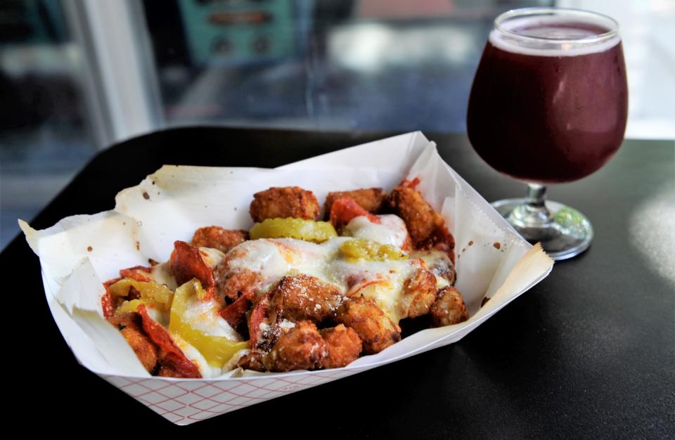 Grab some loaded tots while you're benefitting the Make-A-Wish Foundation at High Score Saloon on Nov. 30.