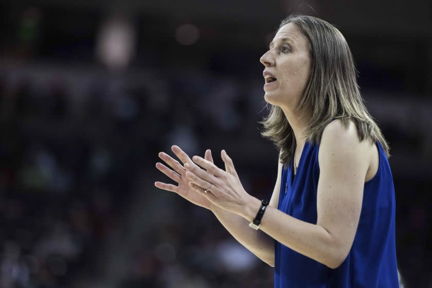 New USC women's basketball coach Lindsay Gottlieb relays instructions from the sideline.