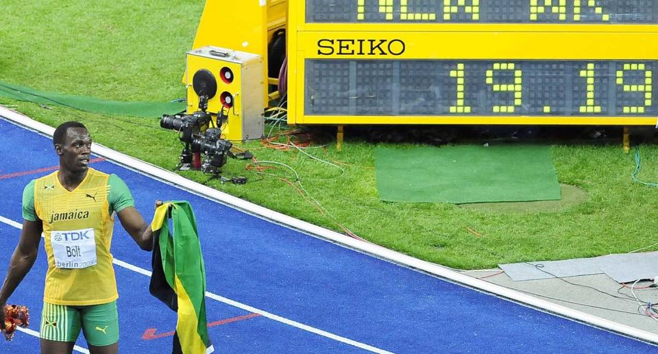 Jamaica's Usain Bolt sets a new World Record to win the Men's 200m Final during the IAAF World Championships at the Olympiastadion, Berlin. 
