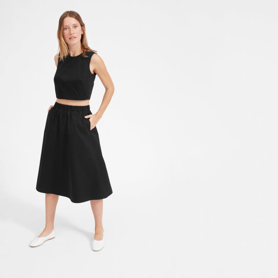 Get the matching&nbsp;set&nbsp;<a href="https://www.everlane.com/products/womens-clean-ctn-a-line-skirt-black?collection=womens-newest-arrivals" target="_blank">here</a>.