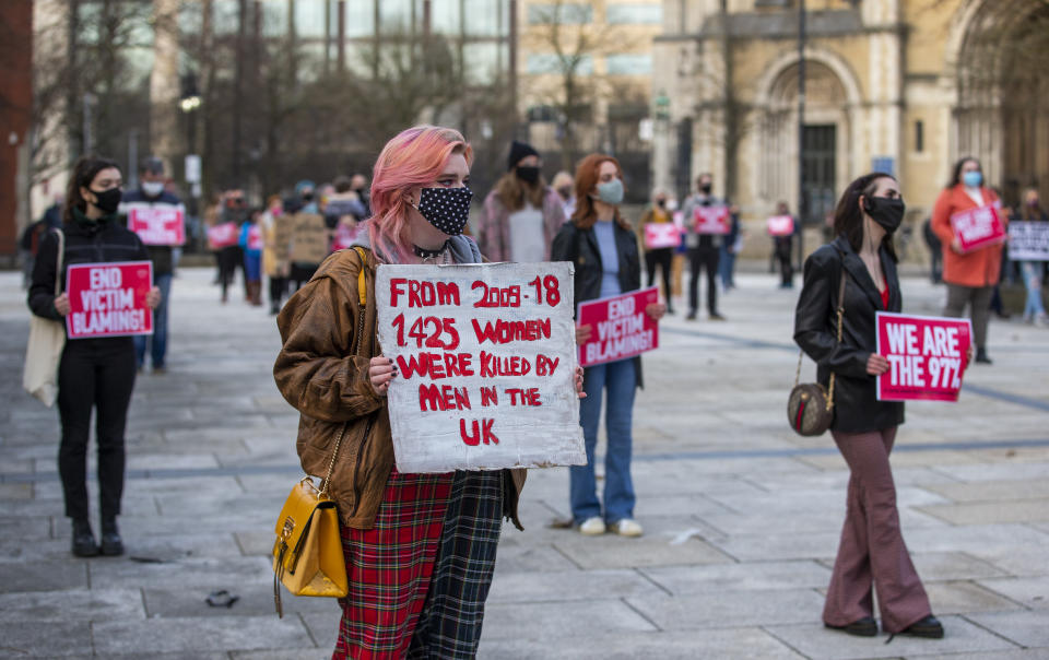 People in Writer's Square, Belfast, taking part in a demonstration against gender violence and to defend the right to protest following the murder of Sarah Everard and subsequent police actions at a vigil in London. Picture date: Tuesday March 16, 2021.