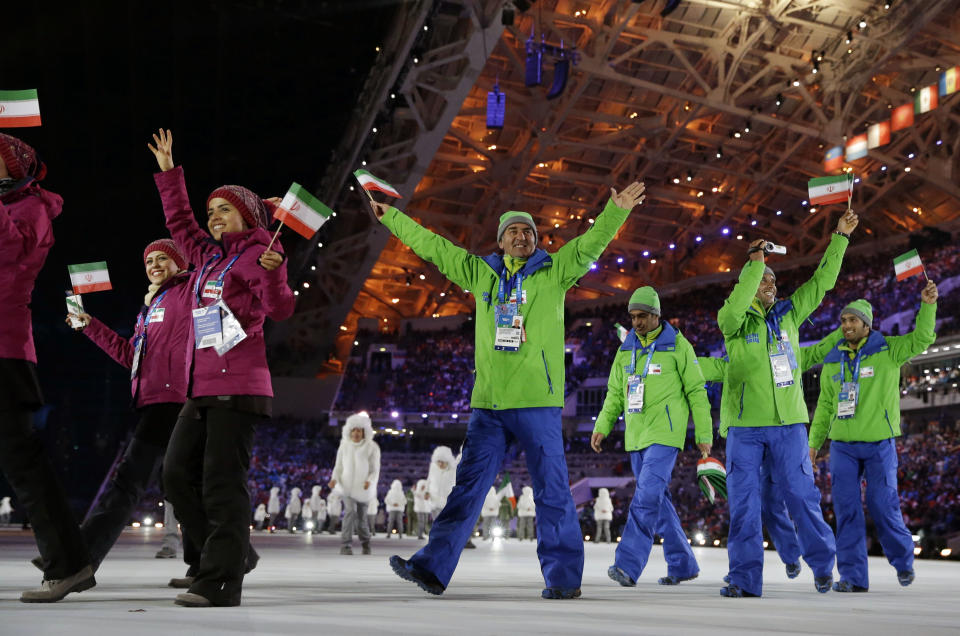 Members of the Iranian team enter the stadium during the opening ceremony of the 2014 Winter Olympics in Sochi, Russia, Friday, Feb. 7, 2014. (AP Photo/Patrick Semansky)