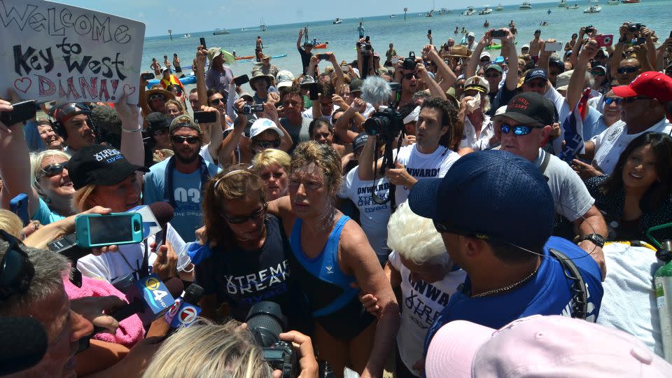 US swimmer Diana Nyad (C) arrives, after 52 hours in the water from Havana, to Key West shore in Florida on September 2, 2013. - Gaston De Cardenas/EFE/Zuma Press