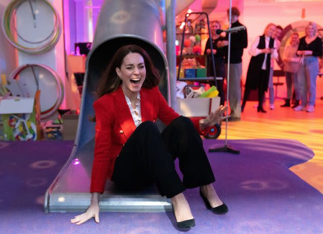 The Duchess of Cambridge goes down a slide during a visit to the Lego Foundation PlayLab on Feb. 22 in Copenhagen, Denmark. (Photo: Pool/Samir Hussein via Getty Images)