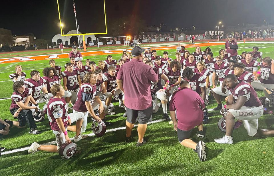 Riverview High football coach Josh Smithers speaks with his team after a 46-7 loss to Clearwater Academy International on Thursday night at Sarasota High