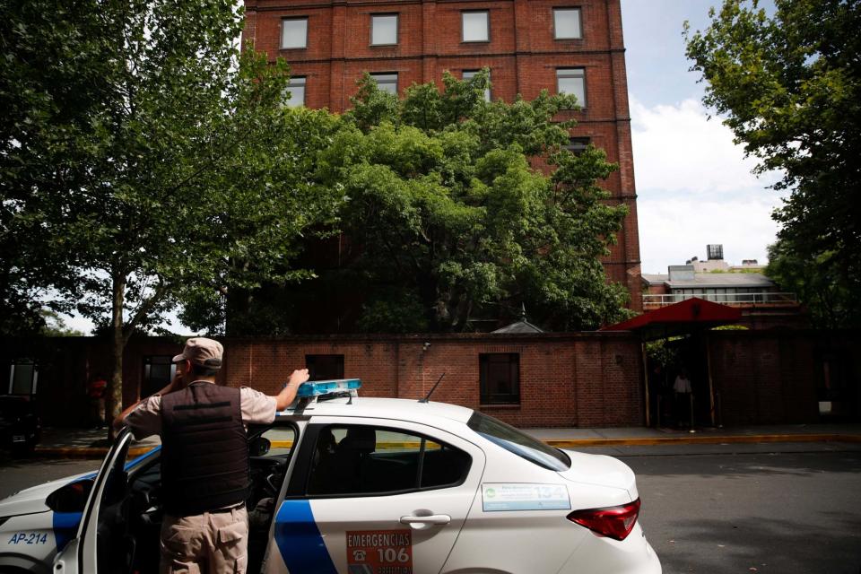 Shooting: A police officer outside the Faena Art Hotel in Buenos Aires after a British tourist was killed (AP)