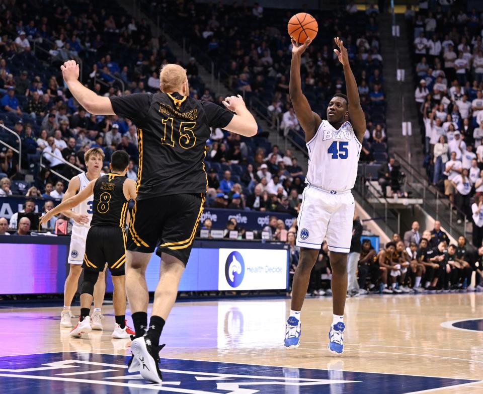 Brigham Young Cougars forward Fousseyni Traore (45) pushes up a three point shot as BYU and SE Louisiana play at the Marriott Center in Provo on Wednesday, Nov. 15, 2023. BYU won 105-48. | Scott G Winterton, Deseret News