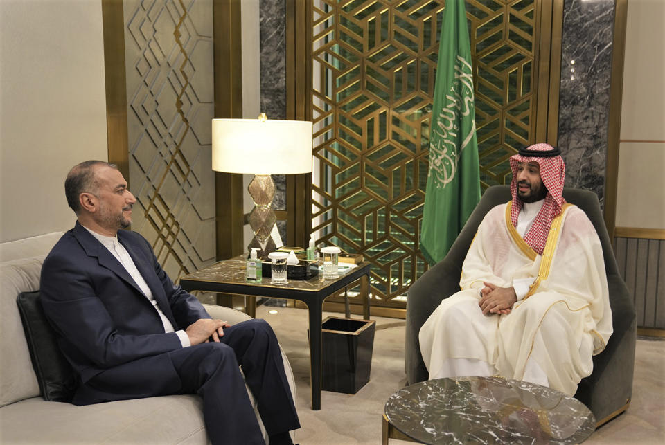 In this picture released by the Iranian Foreign Ministry, Saudi Arabia's Crown Prince Mohammed bin Salman, right, speaks with Iran's Foreign Minister Hossein Amirabdollahian in Jeddah, Saudi Arabia, Friday, Aug. 18, 2023. Iran's foreign minister traveled to Saudi Arabia on Thursday, marking the first trip to the kingdom by Tehran's top diplomat in years after the two nations reached a détente with Chinese mediation. (Iranian Foreign Ministry via AP)