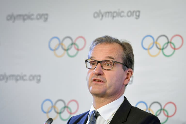 International Olympic Committee (IOC) spokesman Mark Adams attends a press conference during an IOC executive meeting on December 6, 2017 in Lausanne