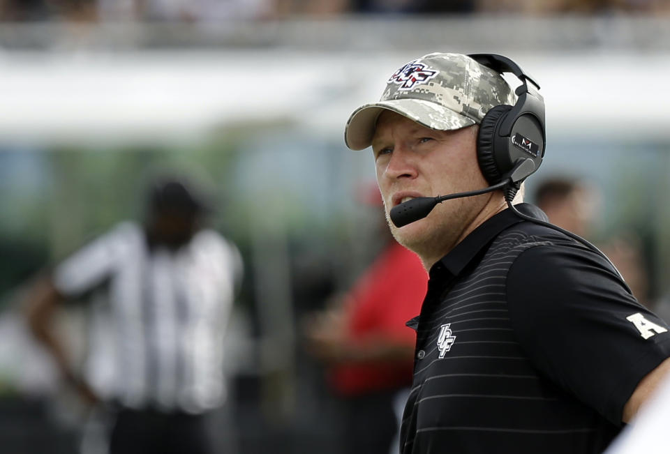 Scott Frost led Central Florida to an undefeated regular season this year. (AP Photo/John Raoux, File)