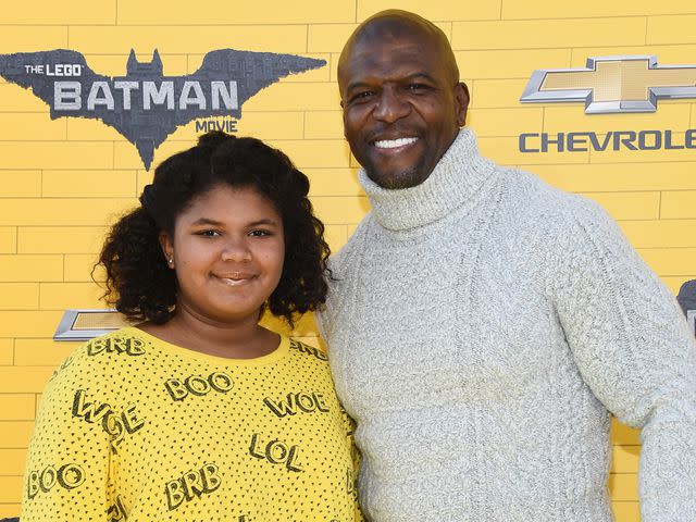 <p>Amanda Edwards/WireImage</p> Terry Crews with his daugther Wynfrey Crews at the premiere of 'The Lego Batman Movie' on February 4, 2017