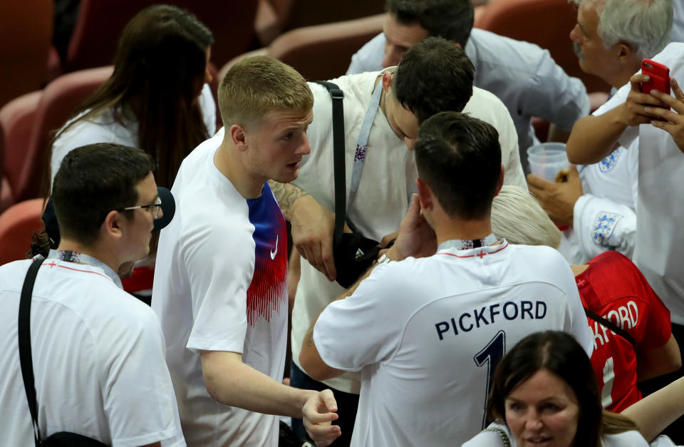 <p>Pickford joins is family in the crowd. </p>