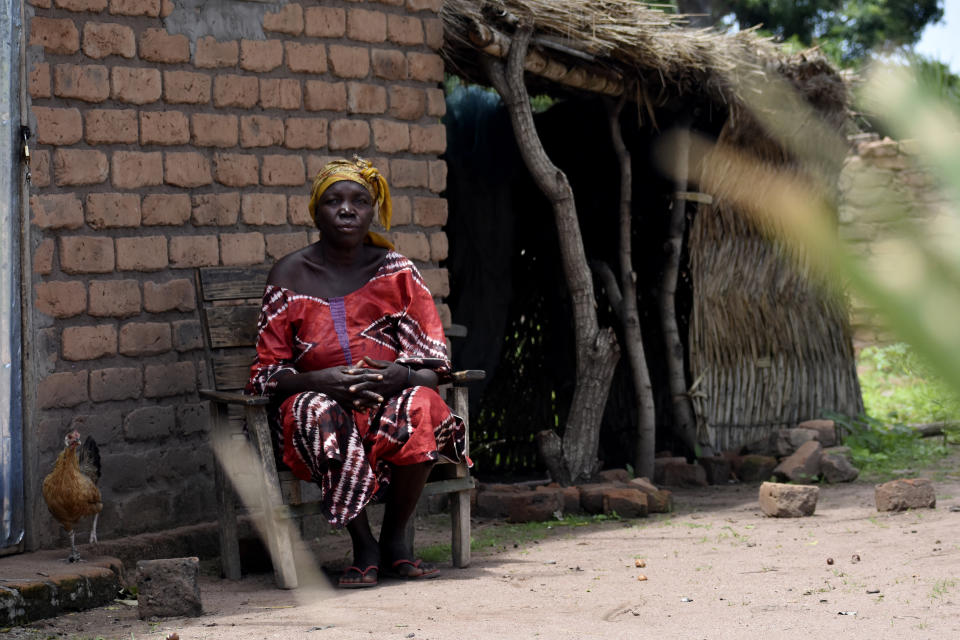 The village chief Marie Djetoyom sits in a chair in the village of Binmar, Chad, Friday, July 19, 2024. (AP Photo/Robert Bociaga)