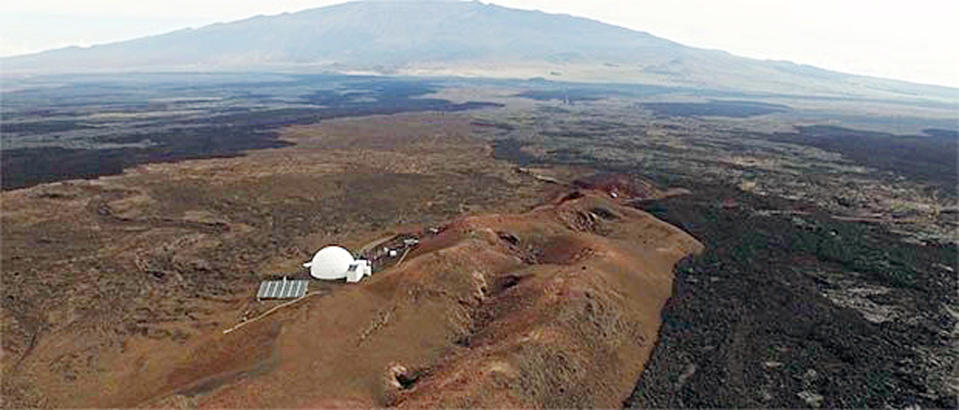 This June, 2015 photo provided by the University of Hawaii shows the domed structure that will house six researchers for eight months in an environment meant to simulate an expedition to Mars, on Mauna Loa on the Big Island of Hawaii. The group will enter the geodesic dome Thursday, Jan. 19, 2017, and spend eight months together in the 1,200 square foot research facility in a study called Hawaii Space Exploration Analog and Simulation (HI-SEAS). They will have no physical contact with any humans outside their group, experience a 20-minute delay in communications and are required to wear space suits whenever they leave the compound. (Sian Proctor/University of Hawaii via AP)