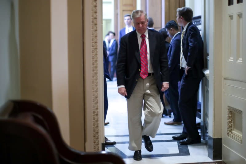 U.S. Senator Graham departs after the weekly Republican caucus luncheon at the U.S. Capitol in Washington