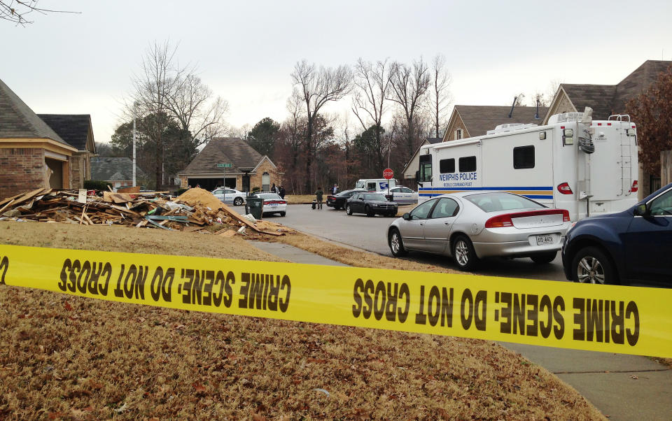 A Memphis Police Department Mobile Command Unit sits in a neighborhood where officers are searching for a missing baby Friday, Jan. 10, 2014 in Memphis, Tenn. One day after 7-week-old Aniston Walker was reported missing, police have charged the child's mother, Andrea Walker, with two counts of aggravated child abuse and two counts of aggravated neglect or endangerment. (AP Photo/Adrian Sainz)