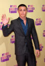 “Teen Wolf” star Colton Haynes added a pop of color to his gray suit with an electric blue shirt.
