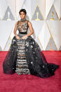 <p><a rel="nofollow" href="https://www.yahoo.com/style/janelle-monae-ups-her-back-and-white-game-for-the-oscars-red-carpet-012015007.html" data-ylk="slk:Janelle Monae;elm:context_link;itc:0;sec:content-canvas;outcm:mb_qualified_link;_E:mb_qualified_link;ct:story;" class="link  yahoo-link">Janelle Monae</a> sticks with a black and white uniform. Yet for the 2017 Oscars, where<em> Moonlight</em> won for best picture, she added some gold to her overall look.<em> (Photo: Getty Images)</em> </p>