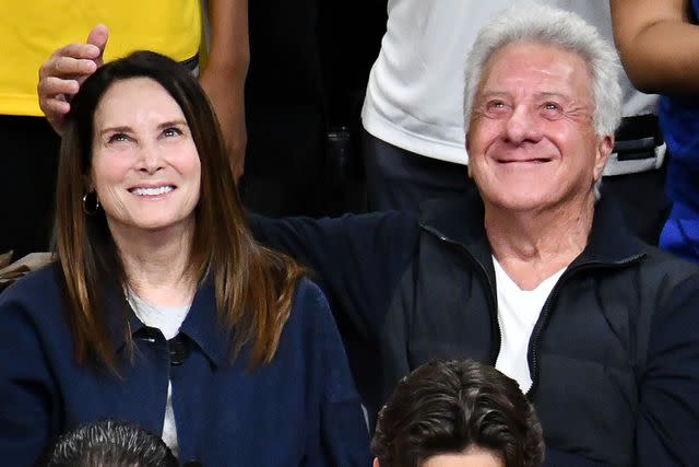 <p>Allen Berezovsky/Getty</p> Dustin Hoffman and wife Lisa at a Lakers game in Los Angeles on May 8, 2023