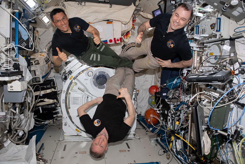 Rubio (upper left) plans to return to Earth next Wednesday with Soyuz crewmates Dmitri Petelin (upper right) and commander Sergei Prokopyev (bottom center) to close out a 371-day stay in space. It will be the third longest flight in space history and a new record for a U.S. astronaut.  / Credit: NASA