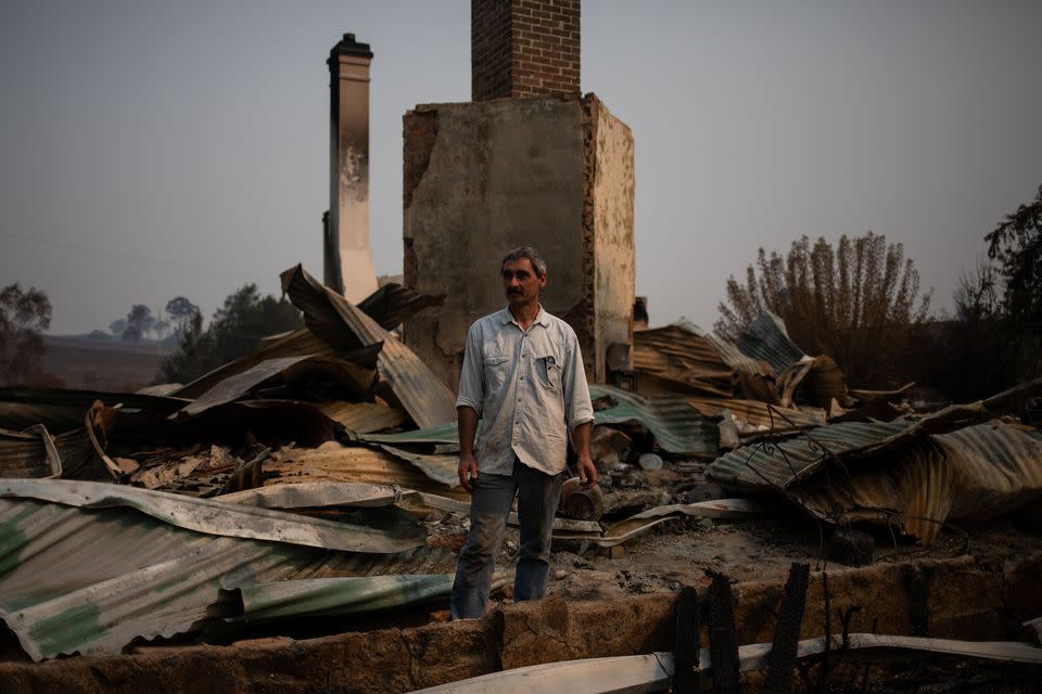 Thousands of people like Philippe Ravenel, pictured here, have lost their homes to the fires. 