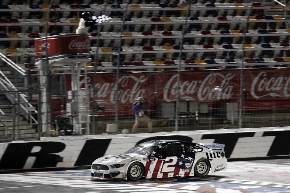 Brad Keselowski wins the NASCAR Cup Series auto race at Charlotte Motor Speedway early Monday, May 25, 2020, in Concord, N.C. (AP Photo/Gerry Broome)