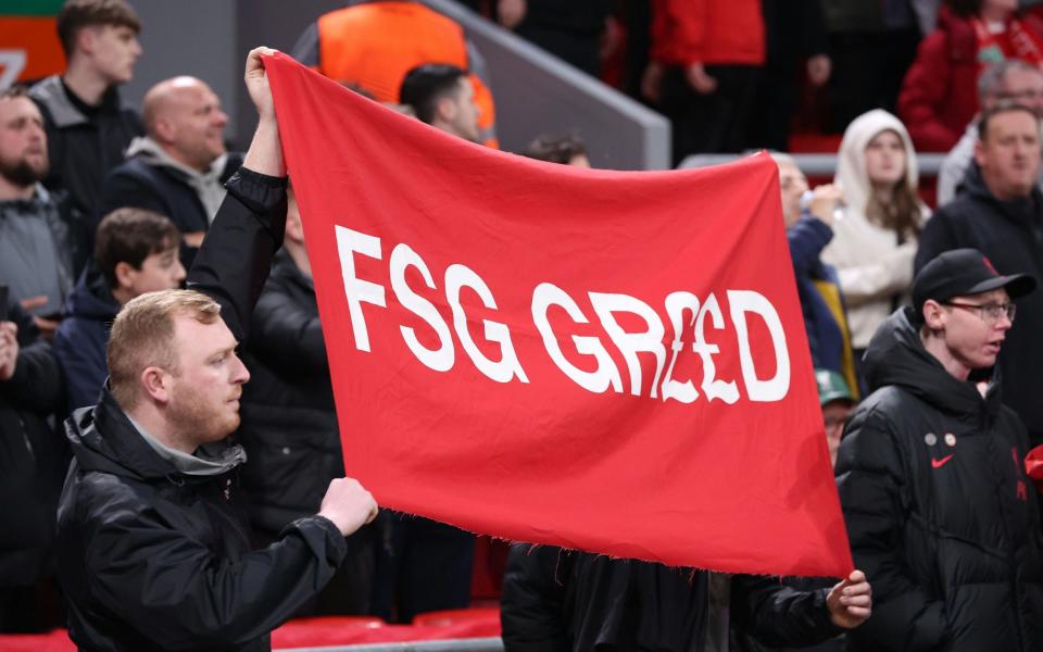 Fans protest ticket prices on the Kop