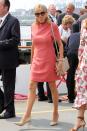 <p>In a salmon mini dress, nude pumps, and black sunglasses while out in Germany. </p>