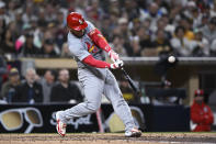 St. Louis Cardinals' Willson Contreras hits a two-run home run against the San Diego Padres during the sixth inning of a baseball game Tuesday, April 2, 2024, in San Diego. (AP Photo/Denis Poroy)