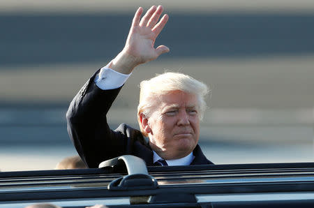 FILE PHOTO: U.S. President Donald Trump waves as he arrives at the Leonardo da Vinci-Fiumicino Airport in Rome, Italy, May 23, 2017. REUTERS/Remo Casilli