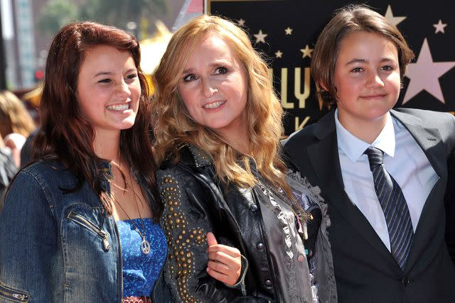 <p>CHRIS DELMAS/AFP/Getty</p> Melissa Etheridge with her son Beckett and her daughter Bailey during her Walk of Fame ceremony on September 27, 201.