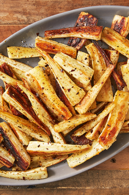 <p>Parsnips don't get nearly the attention they deserve, but that ends now. Roasting them makes them slightly sweet and perfectly tender for a quick side dish you might love more than the main course. </p><p>Get the <a href="https://www.delish.com/uk/cooking/recipes/a29871209/roast-parsnips-recipe/" rel="nofollow noopener" target="_blank" data-ylk="slk:Roasted Parsnips;elm:context_link;itc:0;sec:content-canvas" class="link ">Roasted Parsnips</a> recipe.</p>