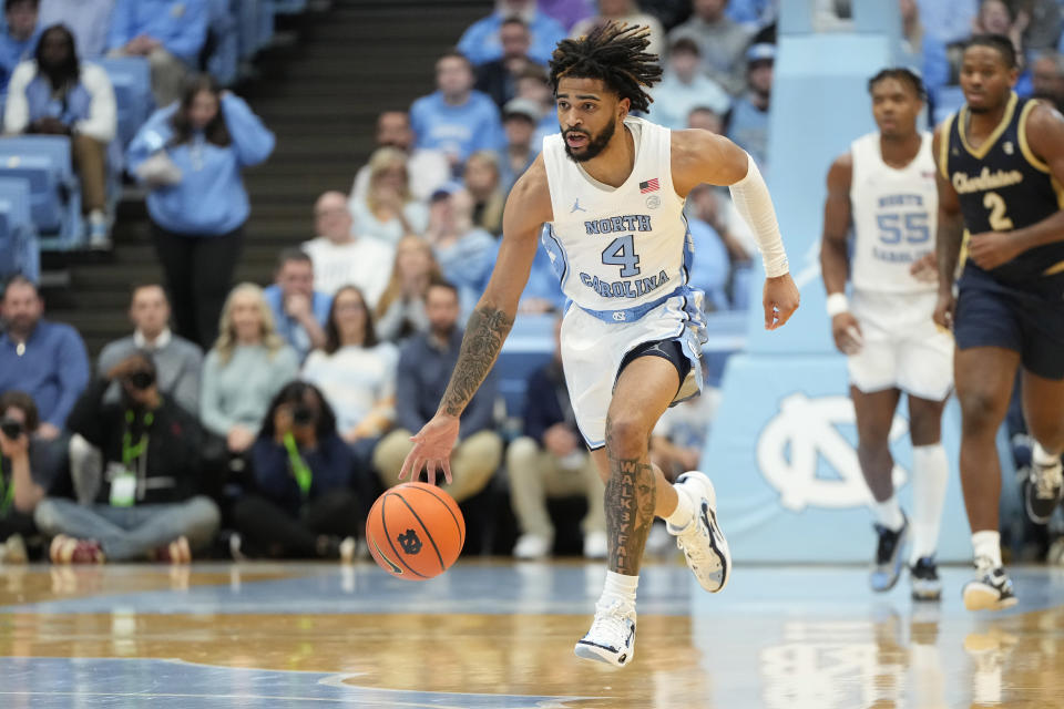 Dec 29, 2023; Chapel Hill, North Carolina, USA; North Carolina Tar Heels guard RJ Davis (4) on the fast break in the second half at Dean E. Smith Center. Bob Donnan-USA TODAY Sports