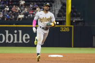 Oakland Athletics' Esteury Ruiz runs the bases after hitting a solo home run during the fifth inning of a baseball game against the Texas Rangers in Arlington, Texas, Friday, Sept. 8, 2023. (AP Photo/LM Otero)