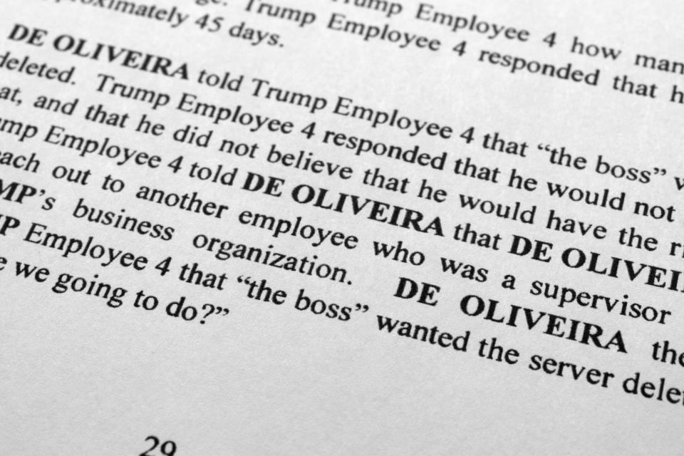 The updated indictment against former President Donald Trump, Walt Nauta and Carlos De Oliveira is photographed Friday, July 28, 2023. New allegations in the classified documents case against Trump deepen his legal jeopardy as he braces for possible additional indictments related to efforts to overturn the 2020 election. (AP Photo/Jon Elswick)