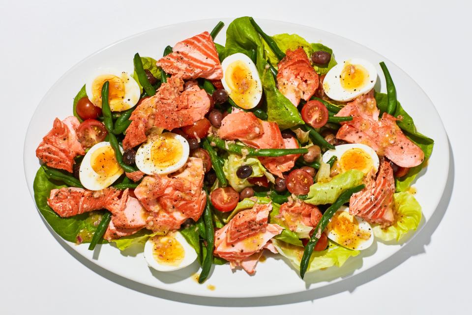 We love a classic Niçoise salad made with fancy oil-packed tuna, but using warm, slow-roasted salmon instead makes the whole thing feel a little more special. About that slow-roasted salmon: It is, hands down, the most foolproof way of achieving tender, perfectly-cooked fish we have ever come up with, no hot pan or sizzling oil necessary. <a rel="nofollow noopener" href="https://www.bonappetit.com/recipe/summer-salmon-nicoise?mbid=synd_yahoo_rss" target="_blank" data-ylk="slk:See recipe.;elm:context_link;itc:0;sec:content-canvas" class="link ">See recipe.</a>