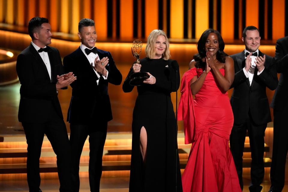 President and CEO of GLADD Sarah Kate Ellis, center, accepts the governors award during the 75th Primetime Emmy Awards on Monday, Jan. 15, 2024, at the Peacock Theater in Los Angeles. (AP Photo/Chris Pizzello) ORG XMIT: CARA507