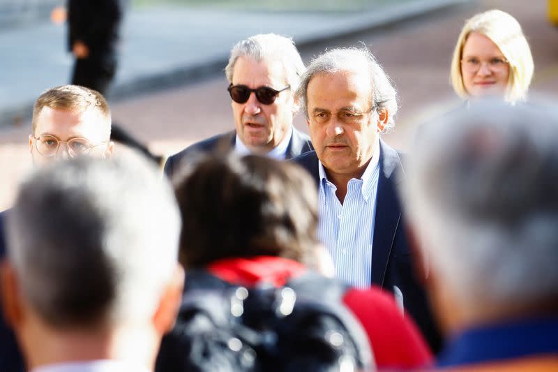 Former soccer officials Sepp Blatter and Michel Platini face corruption charges in Swiss trial