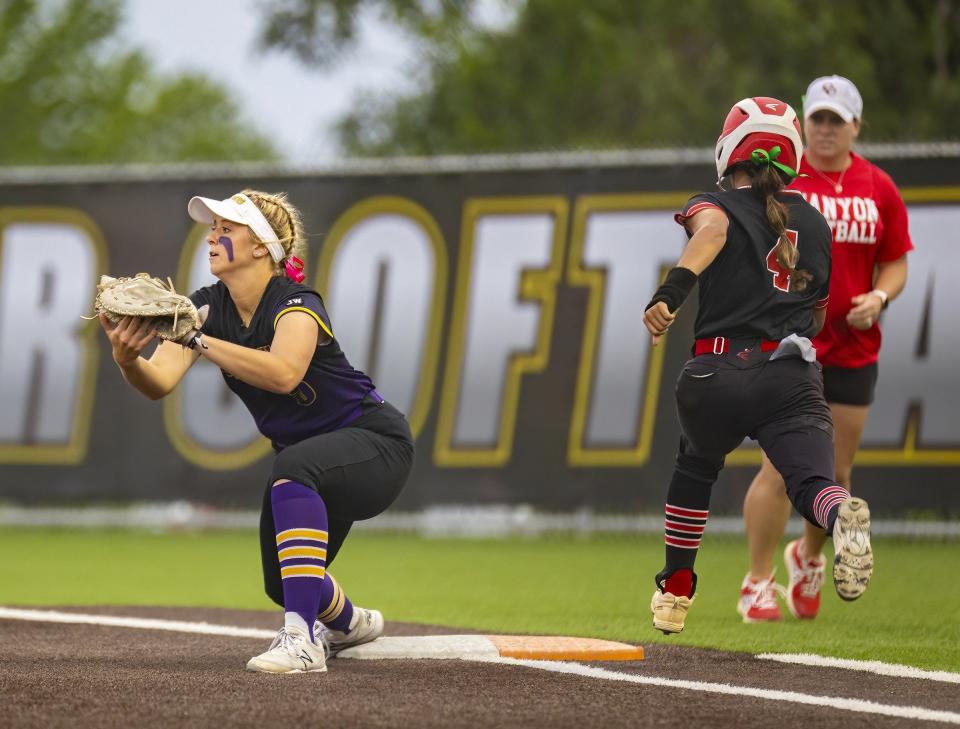 Liberty Hill's Lyssa Petru gets a putout at first base against New Braunfels Canyon during their Class 5A regional quarterfinal softball game May 12. Girls teams played a major role in the Panthers' fifth-place finish.