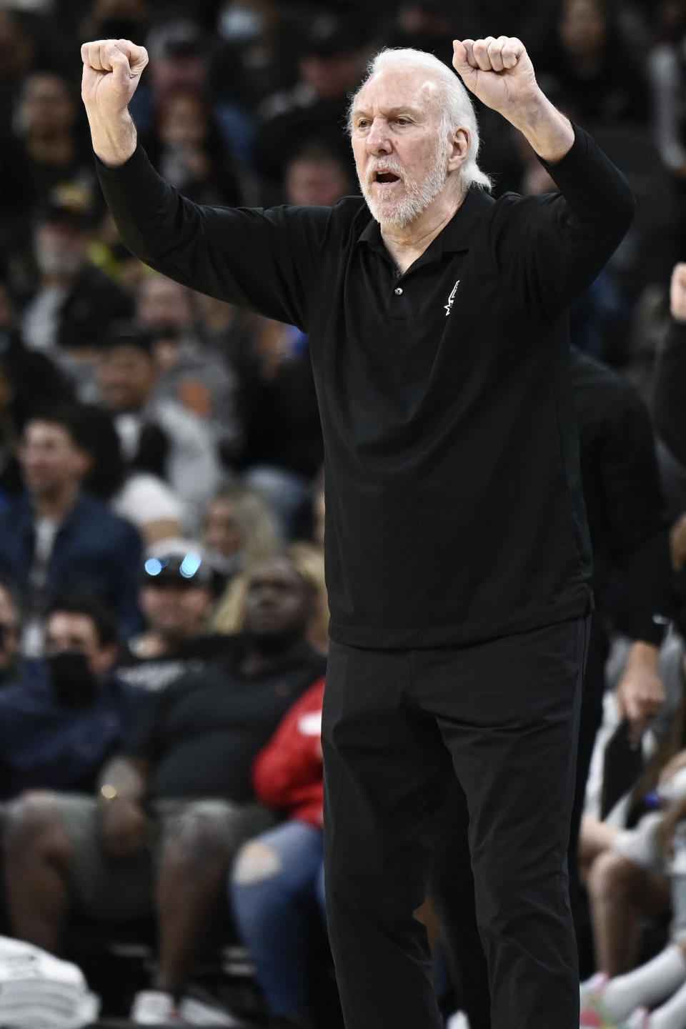 San Antonio Spurs head coach Gregg Popovich gestures to his players during the first half of an NBA basketball game against the New York Knicks, Tuesday, Dec. 7, 2021, in San Antonio. (AP Photo/Darren Abate)