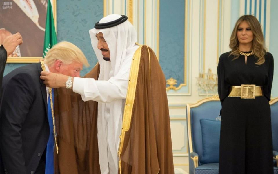 Saudi Arabia's King Salman bin Abdulaziz Al Saud presents U.S. President Donald Trump with the Collar of Abdulaziz  - REUTERS