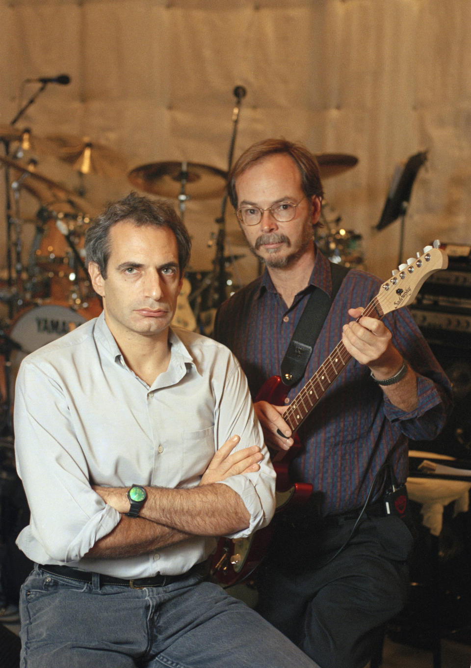 FILE - Donald Fagen, left, and Walter Becker of Steely Dan pose at New York's S.I.R. Studios on Aug. 5, 1993, before a rehearsal for their upcoming tour. Becker died in 2017. Steely Dan, R.E.M., Timbaland, Hillary Lindsey and Dean Pitchford will be inducted into the Songwriters Hall of Fame. The induction ceremony will be held on June 13 in New York. (AP Photo/Richard Drew, File)