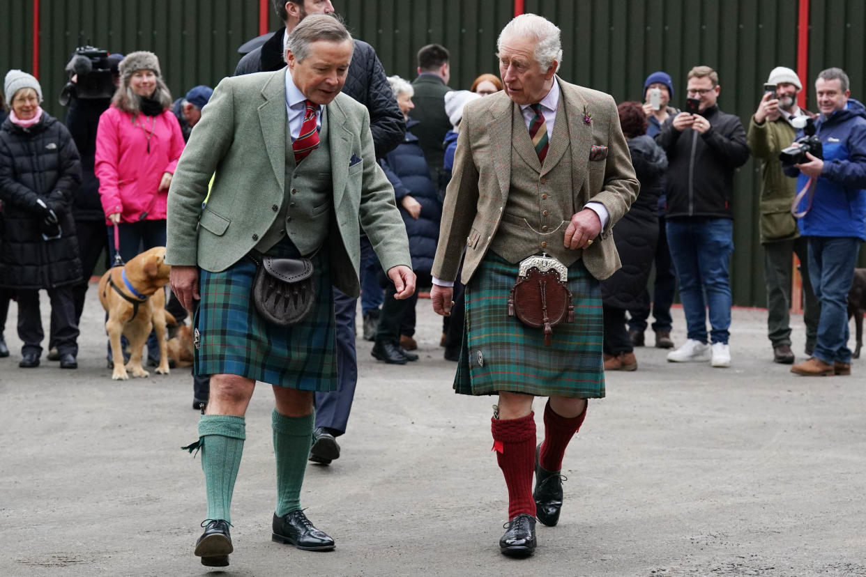 King Charles III visits Aboyne and Mid Deeside Community Shed in Aboyne in Scotland while wearing a kilt. (Getty Images)