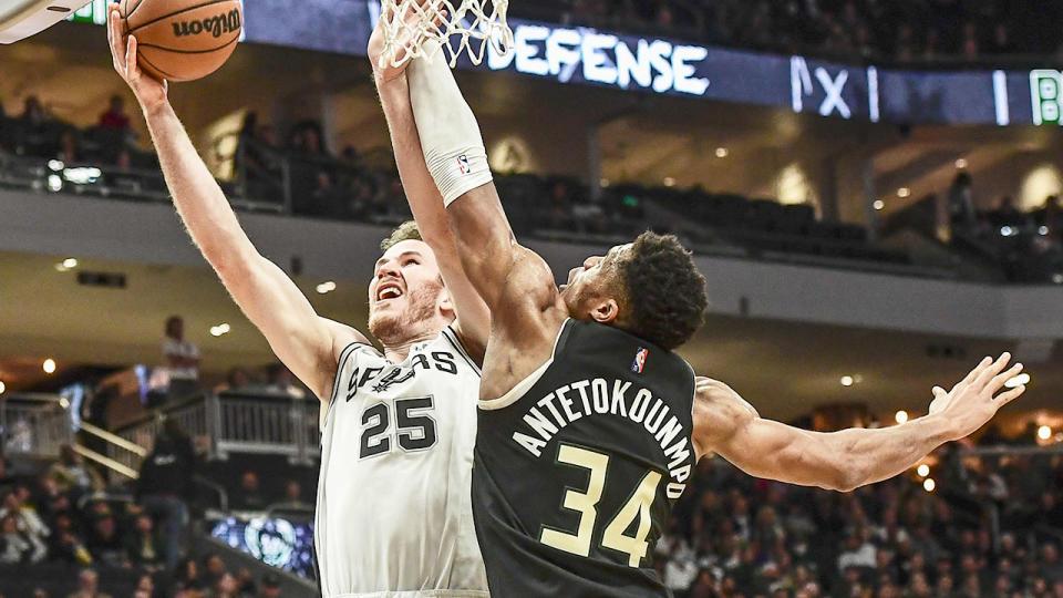 Pictured here, Jakob Poeltl goes up for a lay-up for San Antonio in the NBA.